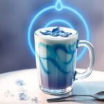 Blue butterfly pea flower latte with coconut froth and throat chakra frequency glow