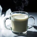 A luminous green tea adaptogen latte in a minimalist glass mug, glowing softly like quartz.